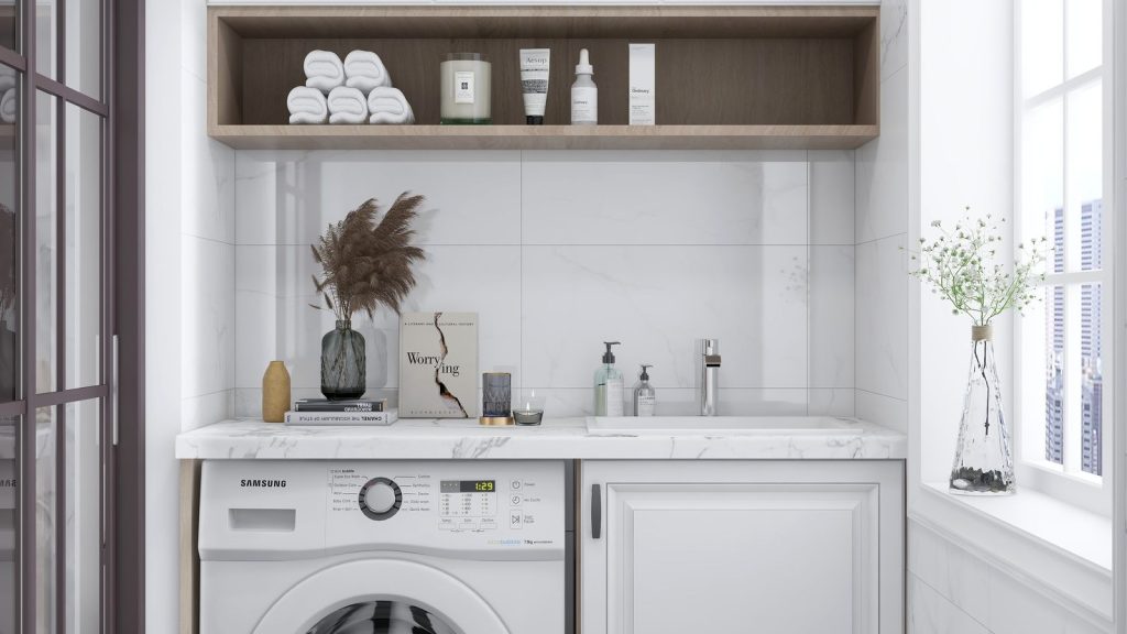 Meuble lave-linge intégré dans une buanderie moderne et lumineuse
